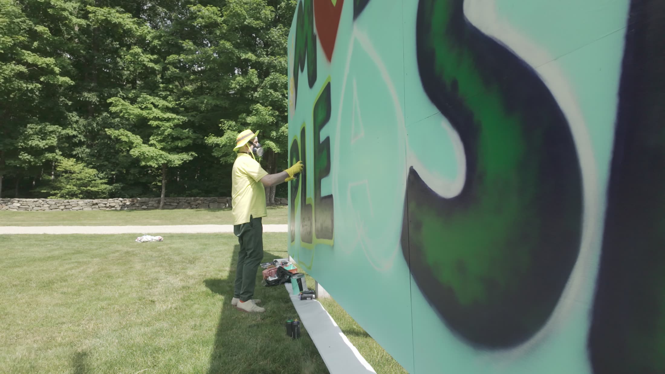 Mural artist at work — behind the scenes