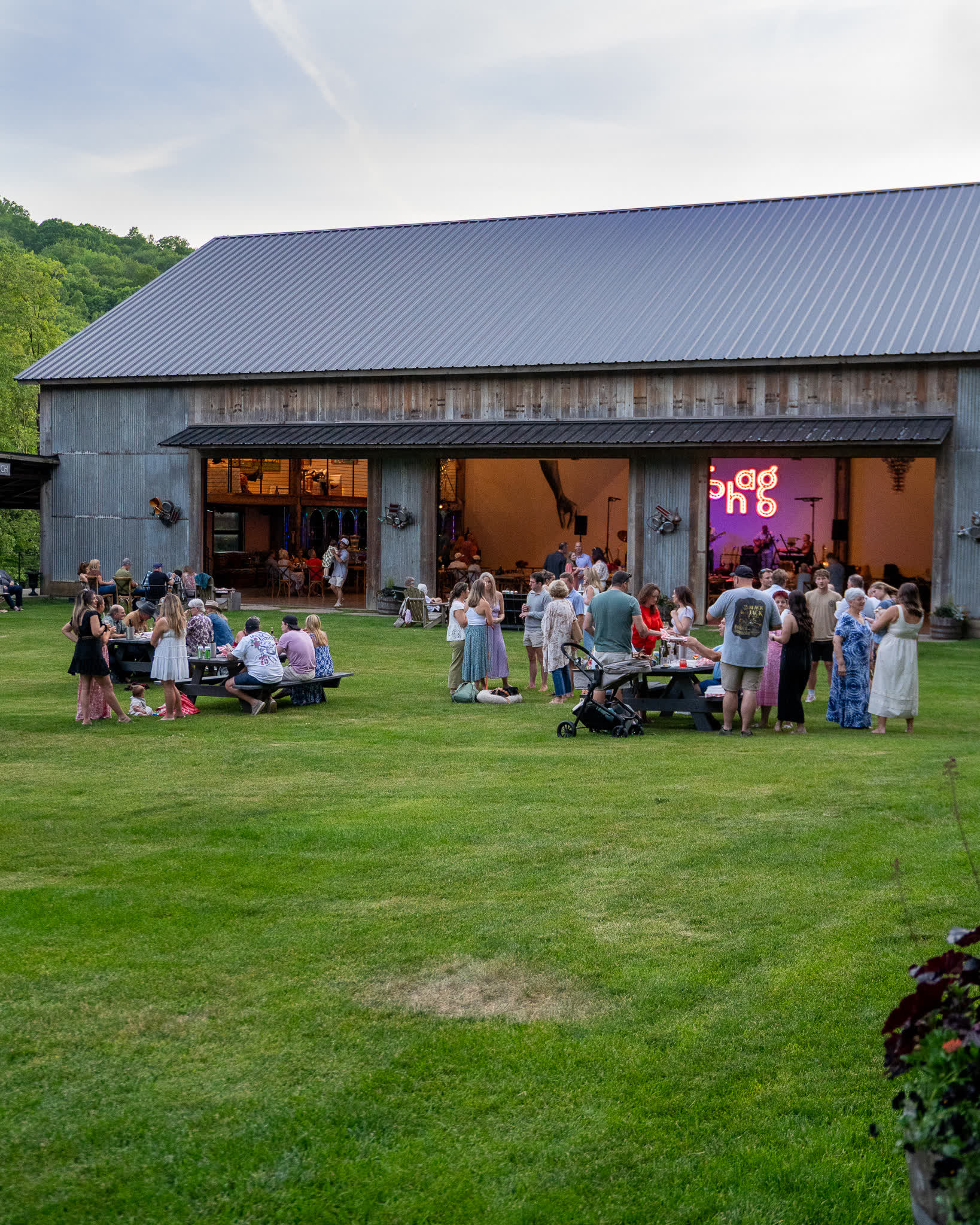 Dusk crowd outside the barn