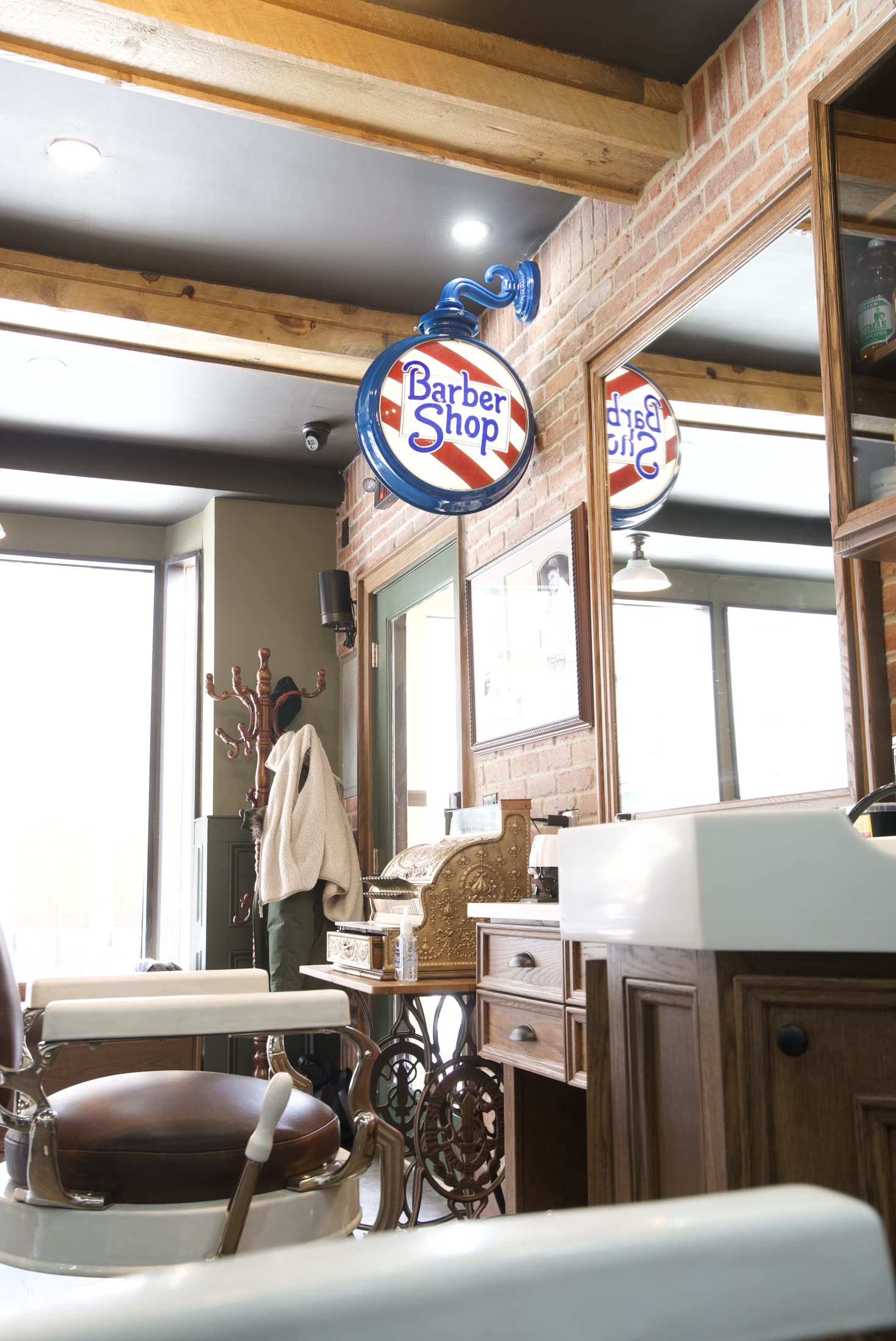 The shop sign and antique register